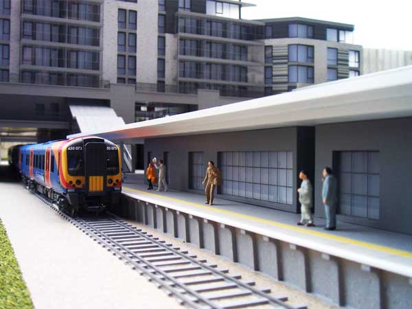 Fine Form models of a train pulling in to a modern station platform